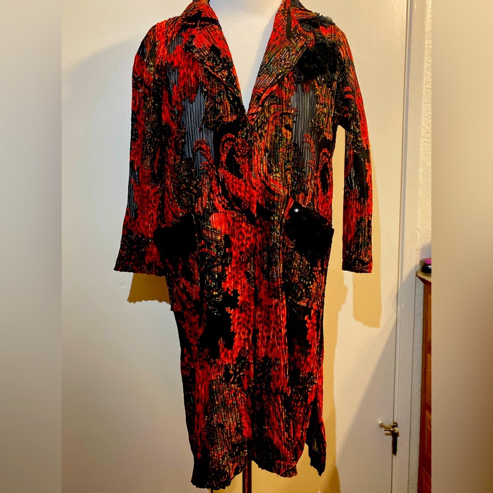 Asian made- women’s long designer coat with flower and pattern very electric